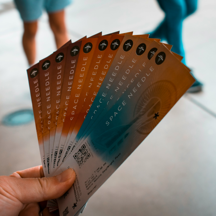 Person holding event ticket